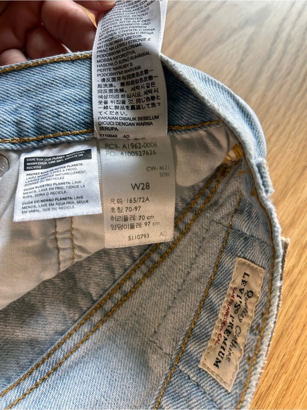 Levi's distressed light wash long denim button fly jean shorts size 28
